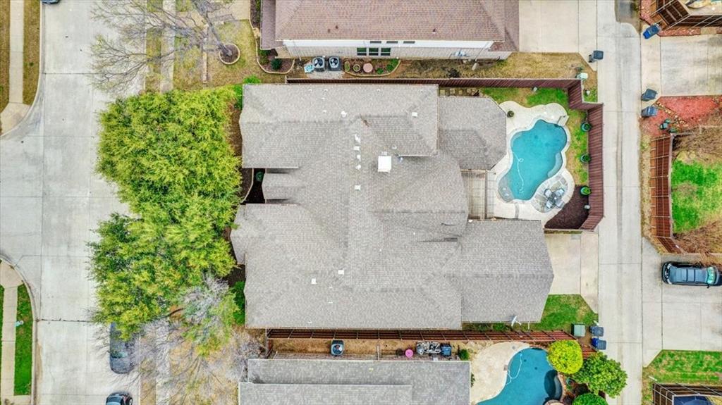 2015 Midhurst Drive Allen, TX 75013 - Photo 34 of 37 an aerial view of a house with a yard and potted plants