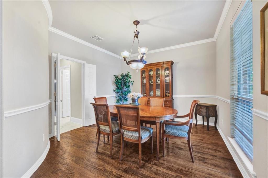 2015 Midhurst Drive Allen, TX 75013 - Photo 4 of 37 a view of a dining room with furniture window and wooden floor