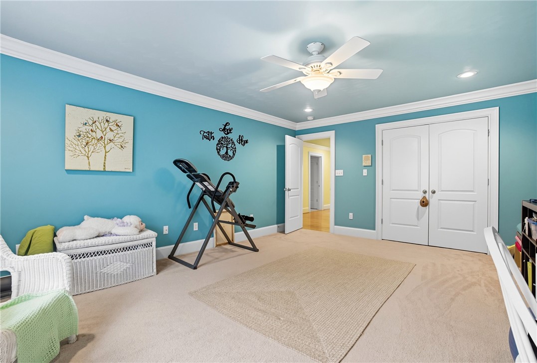 2328 Spindrift Road Virginia Beach, VA 23451 - Photo 17 of 50 Carpeted bedroom featuring ornamental molding, a closet, ceiling fan, and recessed lighting