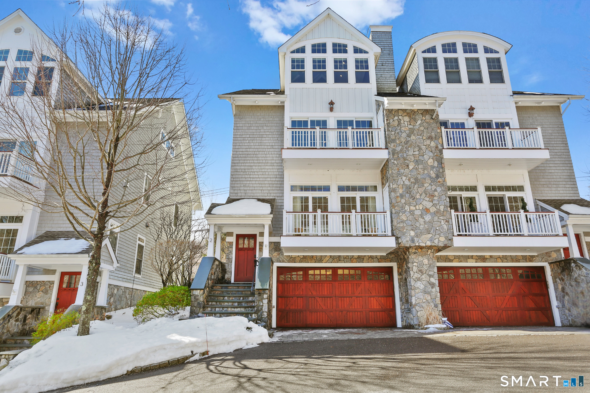 2 Trout Creek Road, Unit 2 Shelton, CT 06484 - Photo 1 of 38 Distinguished front entry framed by stone facade and exquisite architectural detail, setting the tone for refined living in Aspen Ridge Estates.