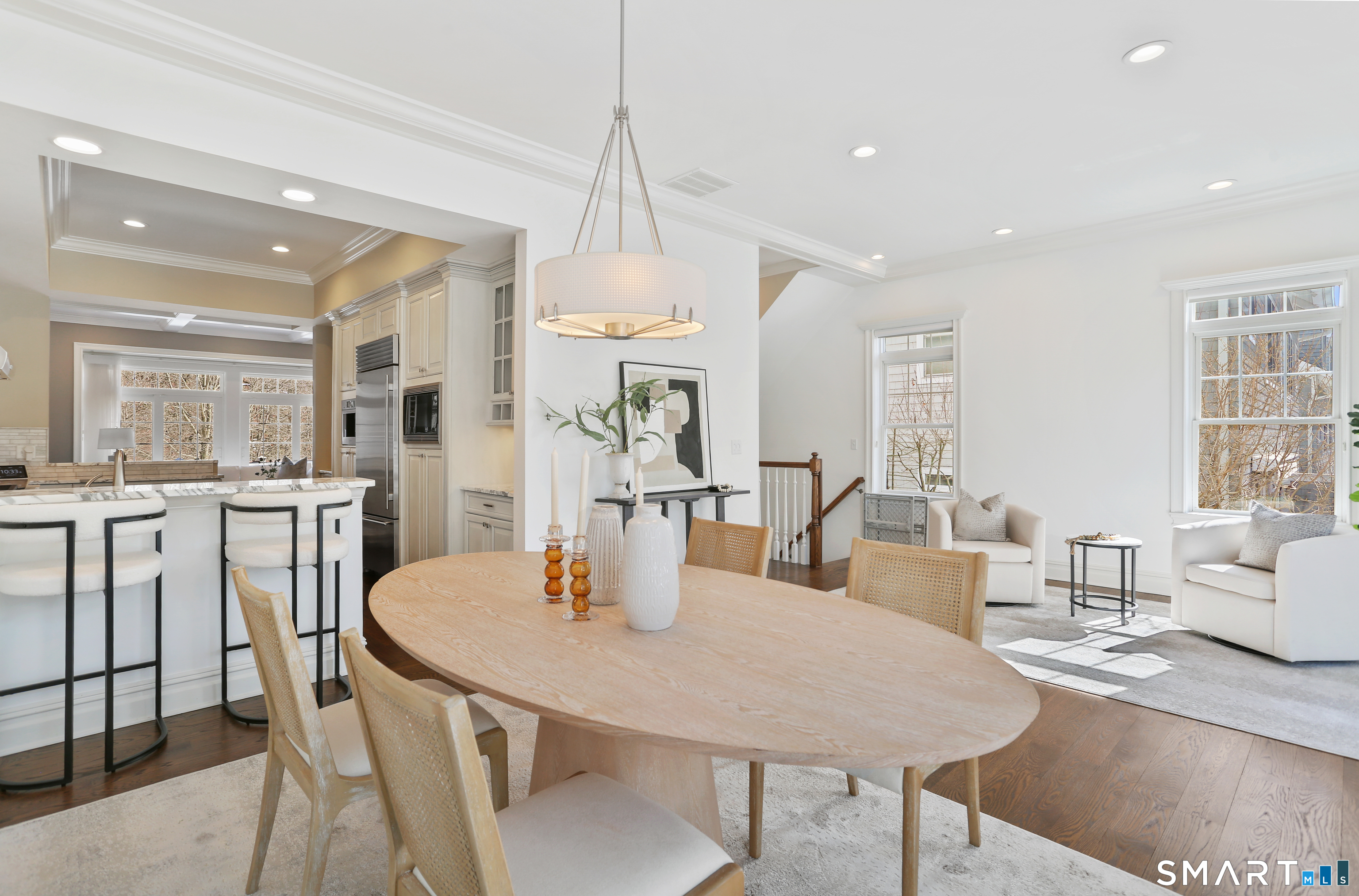 2 Trout Creek Road, Unit 2 Shelton, CT 06484 - Photo 11 of 38 Open dining area seamlessly connected to the chef's kitchen, creating an inviting setting for both everyday meals and entertaining.