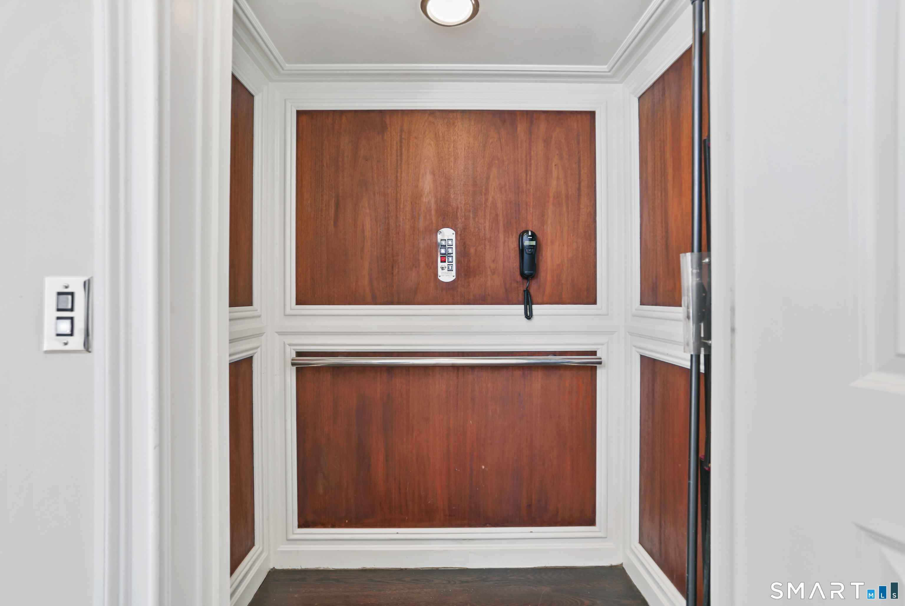 2 Trout Creek Road, Unit 2 Shelton, CT 06484 - Photo 31 of 38 Private in-home elevator with elegant wood paneling providing easy access to all levels.