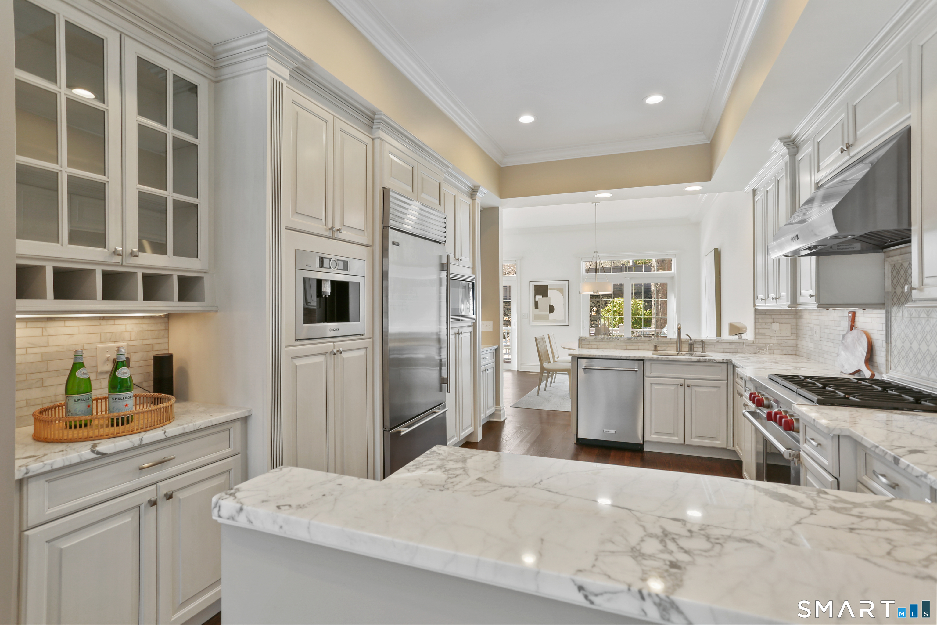 2 Trout Creek Road, Unit 2 Shelton, CT 06484 - Photo 8 of 38 Beautiful marble countertops and custom cabinetry highlight the kitchen.