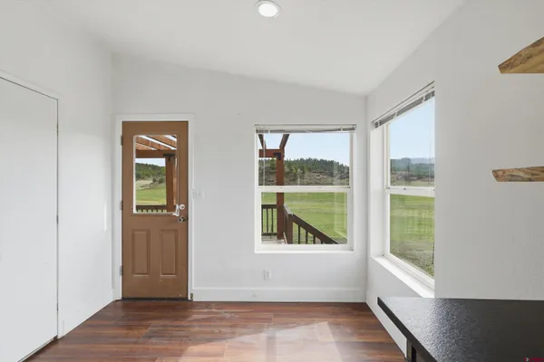 a view of an empty room with large window