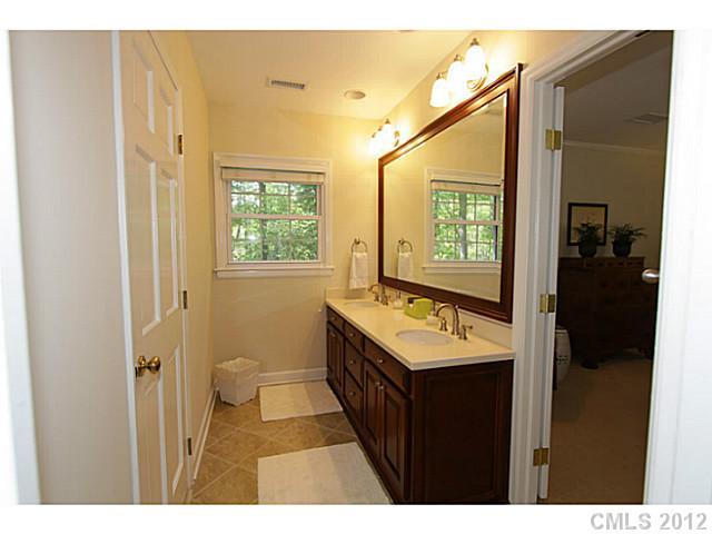 3100 High Ridge Road Charlotte, NC 28270 - Photo 13 of 16 a bathroom with a sink mirror vanity and toilet