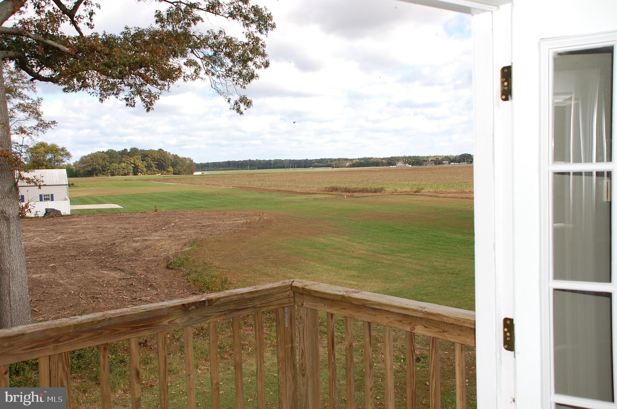 15333 Hudson Road Milton, DE 19968 - Photo 11 of 28 a view of a ocean from a balcony