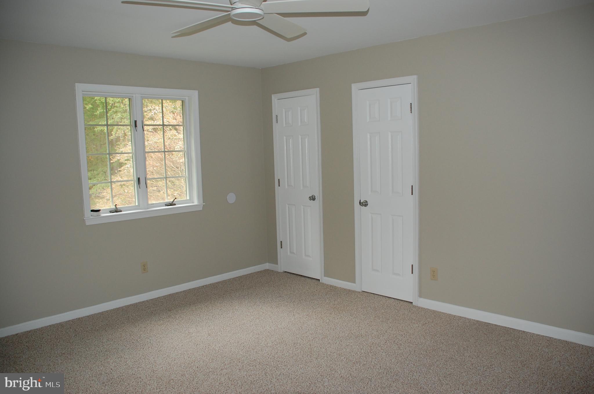 15333 Hudson Road Milton, DE 19968 - Photo 18 of 28 an empty room with a window