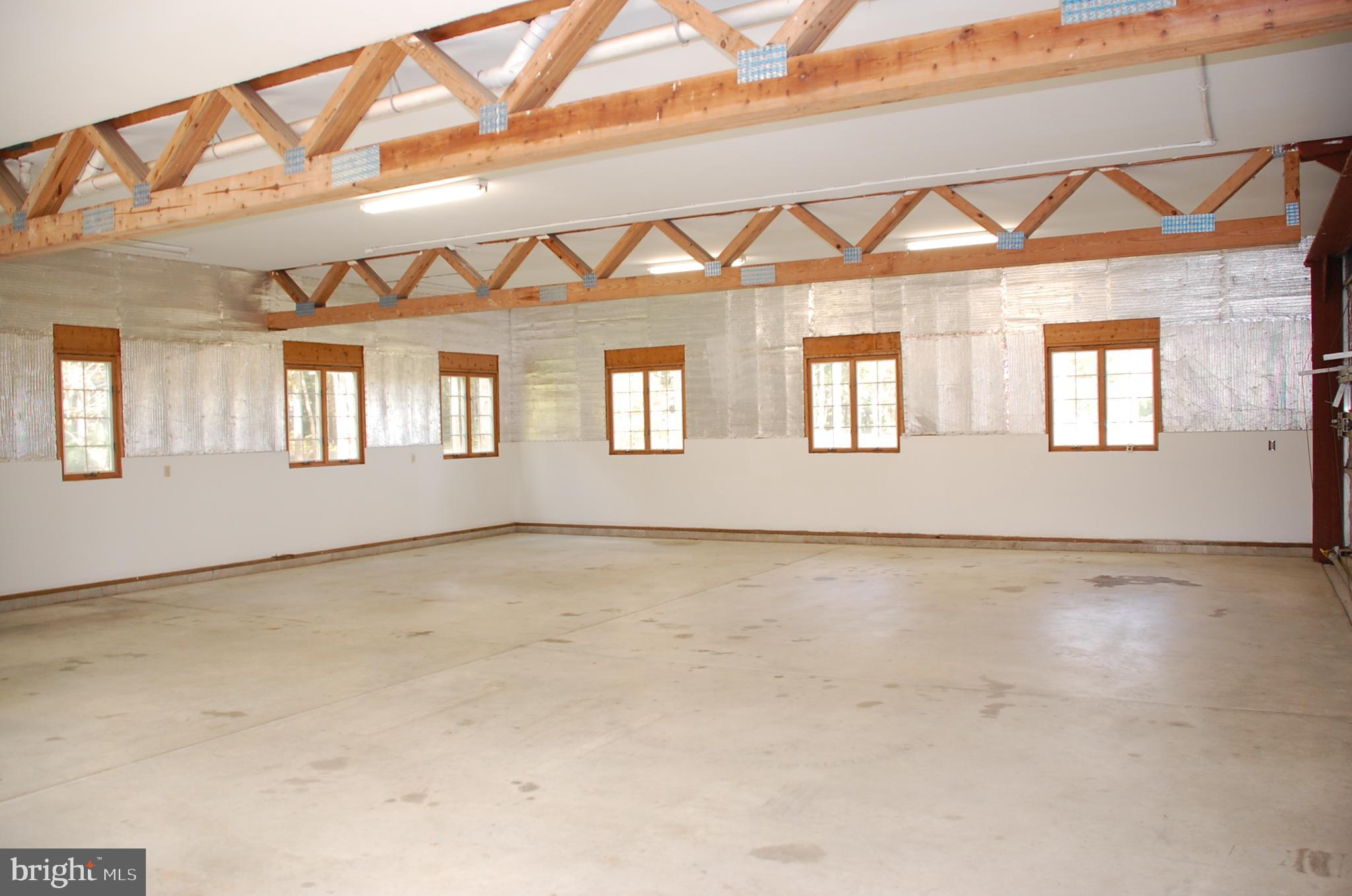 15333 Hudson Road Milton, DE 19968 - Photo 26 of 28 a view of an empty room with a window