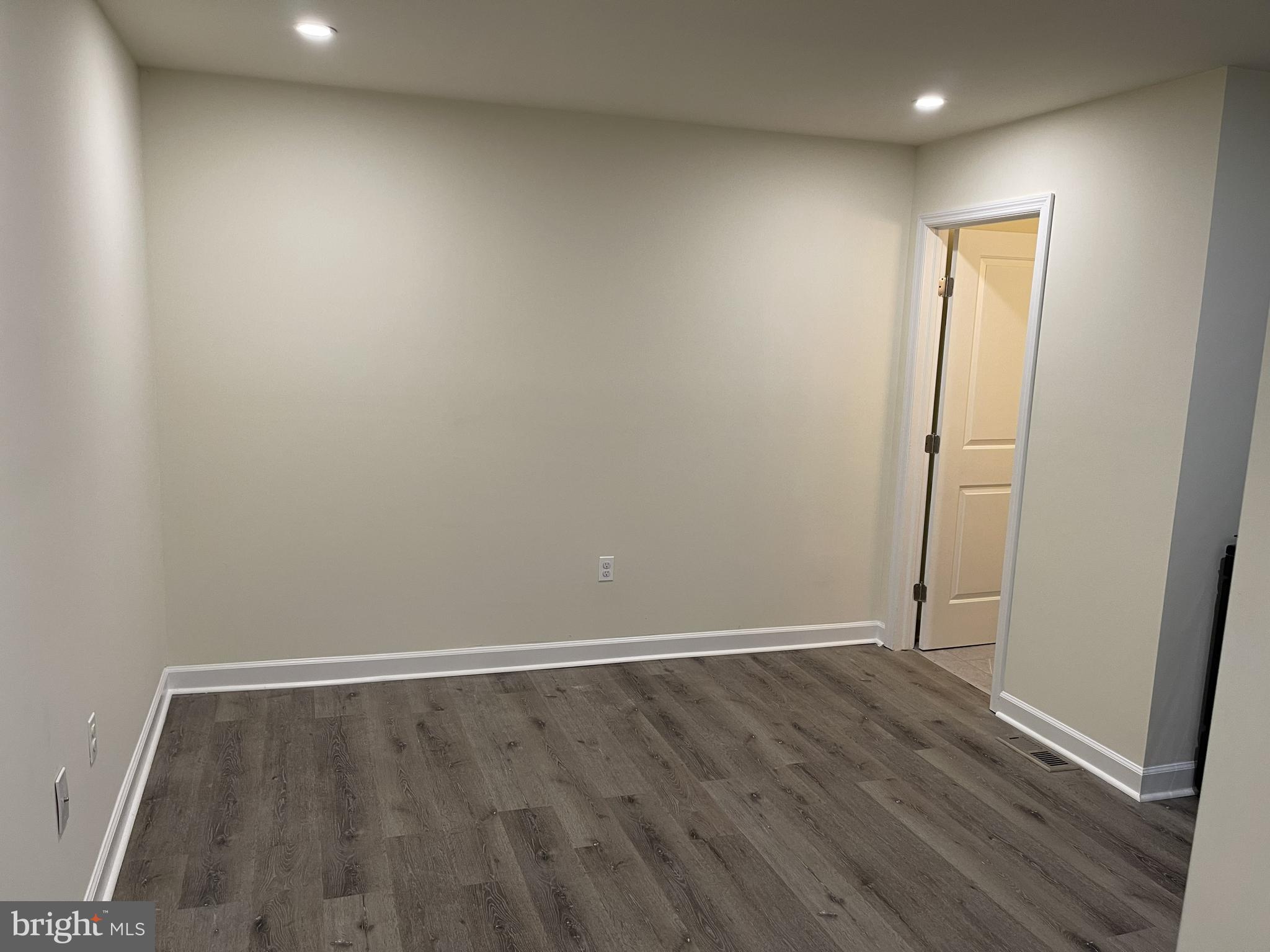 351-349 Oakwood Avenue, Unit 351A Glassboro, NJ 08028 - Photo 3 of 4 wooden floor in an empty room