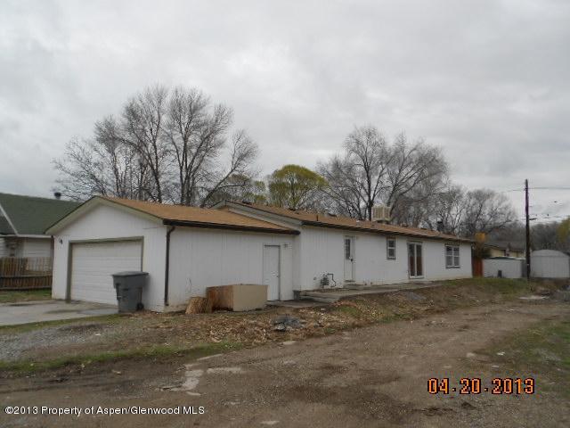 141 Daniel Avenue Rifle, CO 81650 - Photo 1 of 13 a view of a house with a patio