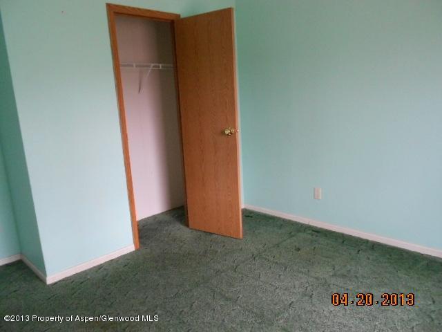 141 Daniel Avenue Rifle, CO 81650 - Photo 10 of 13 an empty room with an entrance