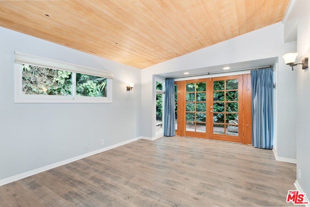 9614 Heather Road Beverly Hills, CA 90210 - Photo 11 of 25 a view of an empty room with a window