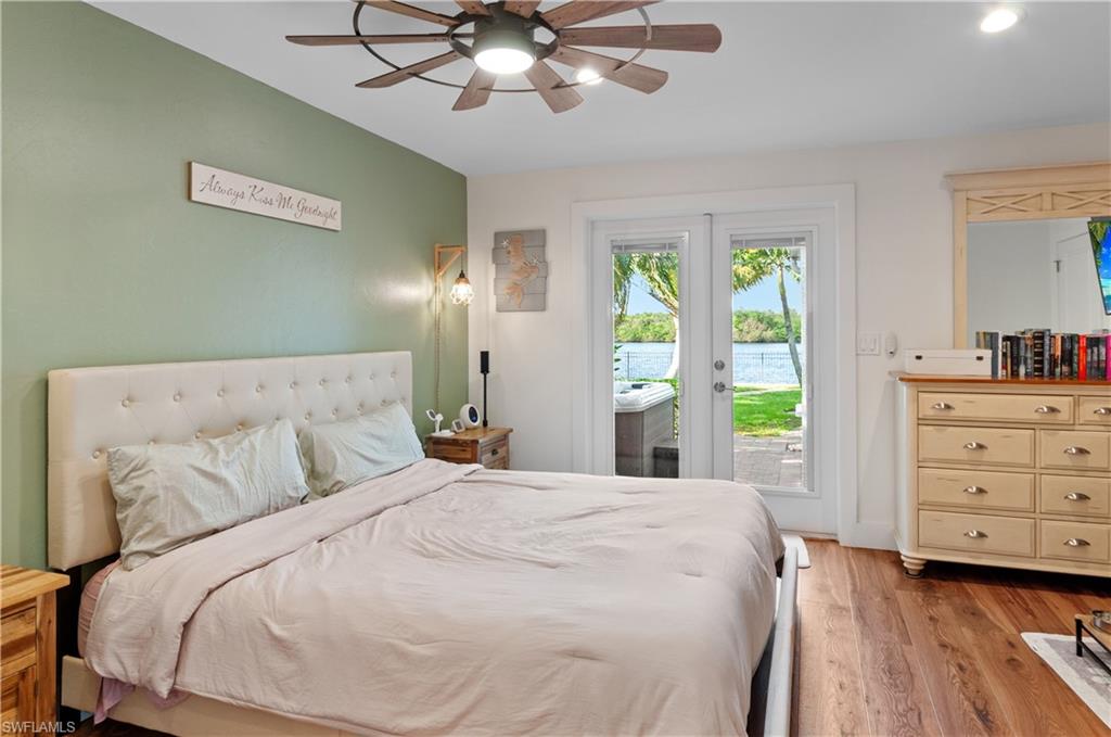 13308 Island Road Fort Myers, FL 33905 - Photo 19 of 39 a bedroom with a bed and a window