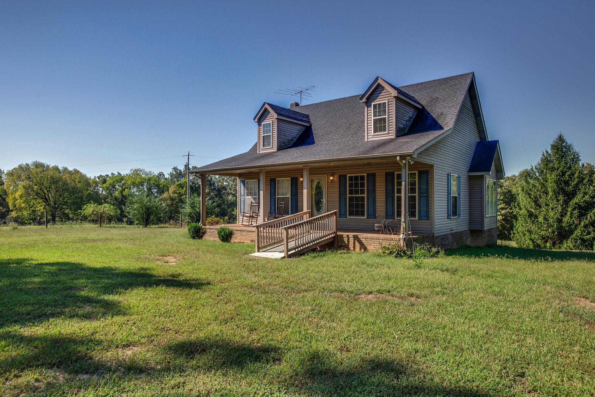 8120 Primm Springs Road Primm Springs, TN 38476 - Photo 3 of 27 a view of a house with a yard