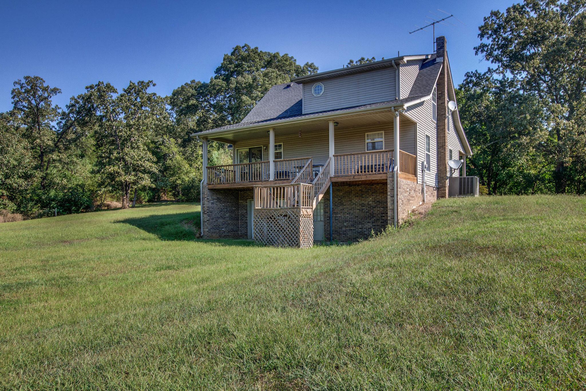 8120 Primm Springs Road Primm Springs, TN 38476 - Photo 25 of 27 front view of a house with a yard