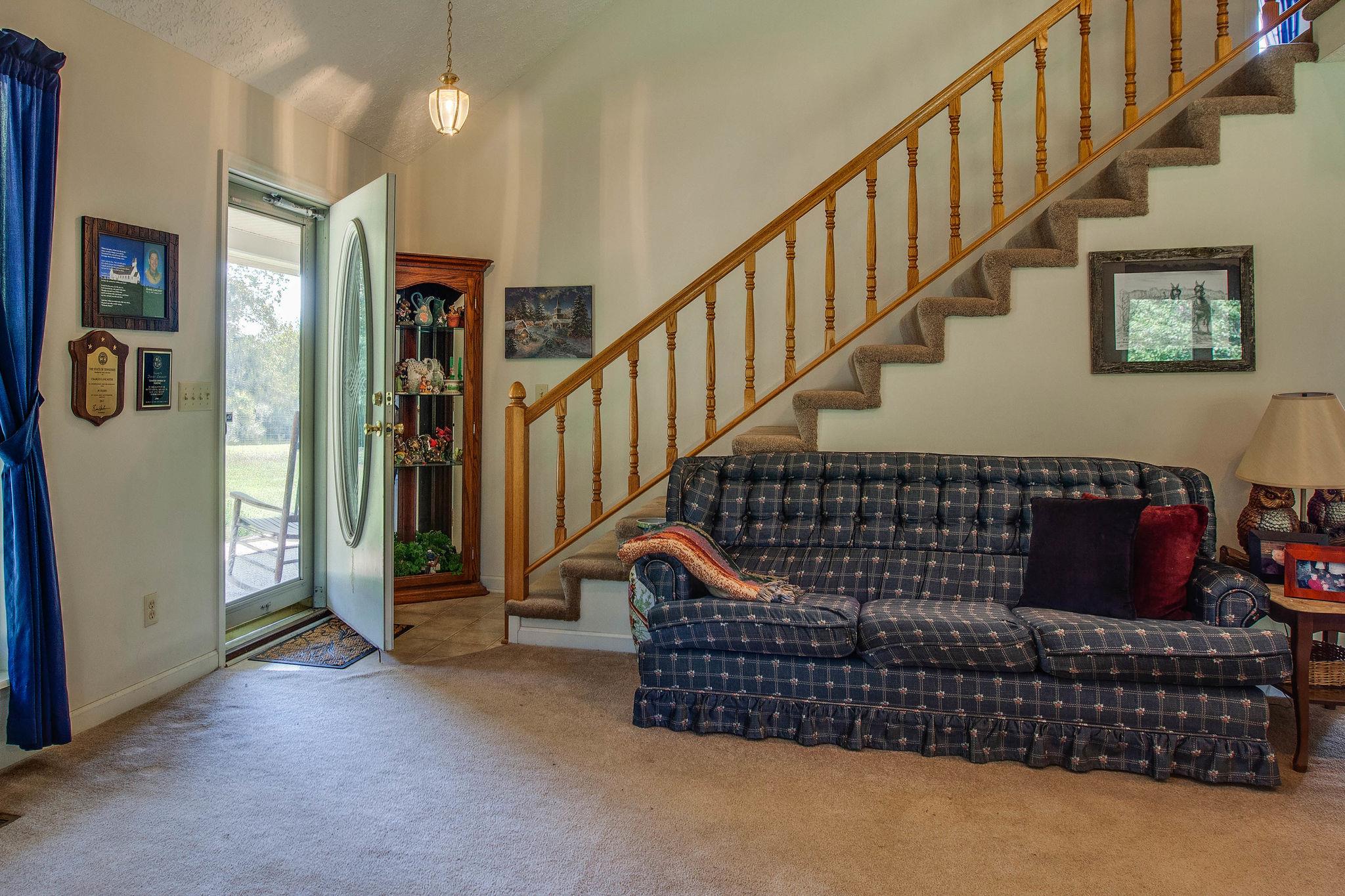 8120 Primm Springs Road Primm Springs, TN 38476 - Photo 5 of 27 a living room with furniture