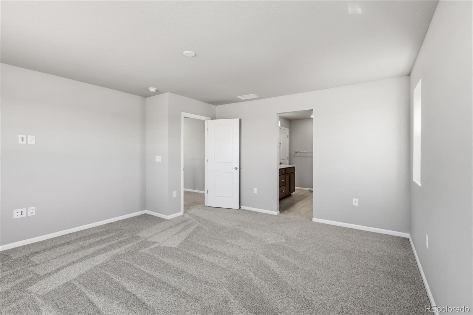 15293 Olive Way Thornton, CO 80602 - Photo 15 of 29 a view of an empty room
