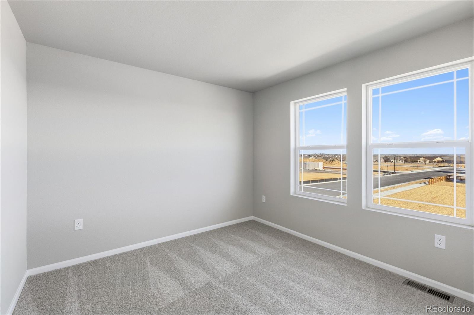 15293 Olive Way Thornton, CO 80602 - Photo 20 of 29 an empty room with a window