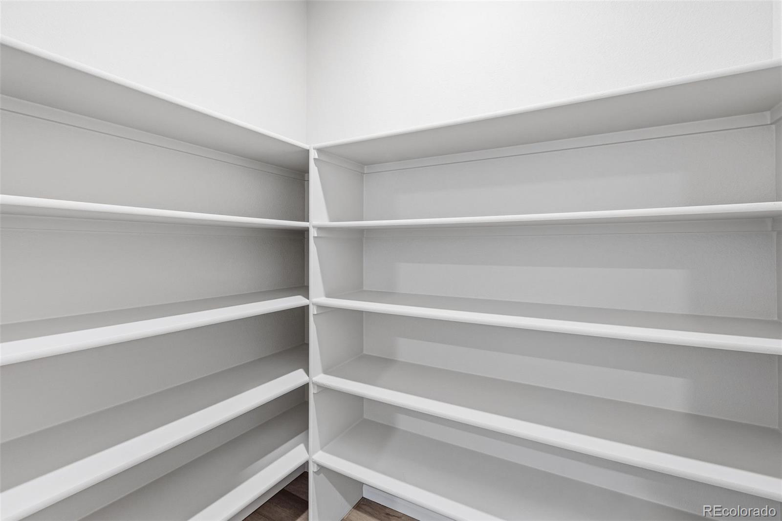 15293 Olive Way Thornton, CO 80602 - Photo 6 of 29 a view of walk in closet