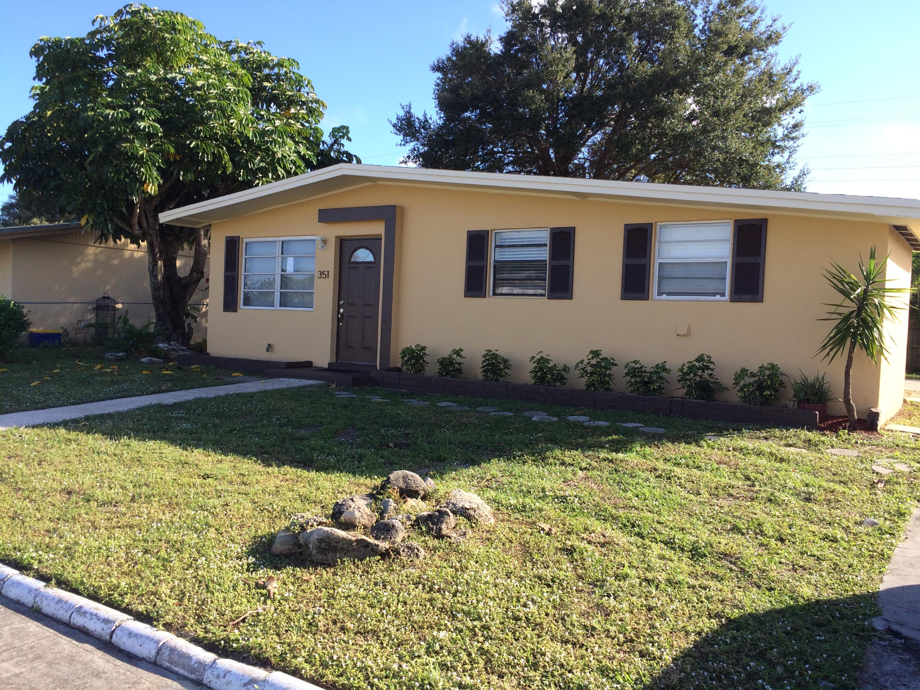 351 West 16th Way Riviera Beach, FL 33404 - Photo 1 of 20 Front