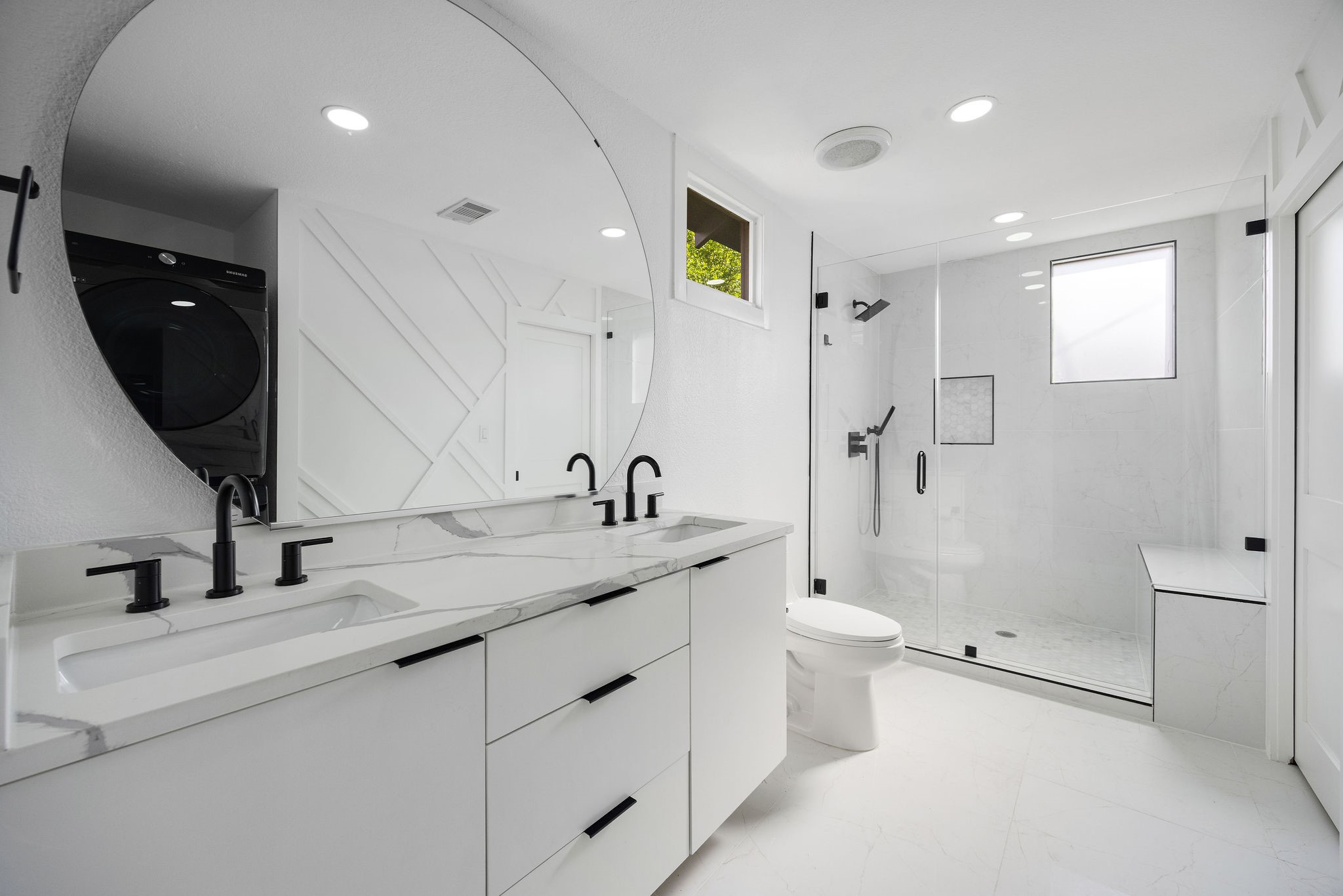 1310 Walton Street Houston, TX 77009 - Photo 11 of 19 Fully remodeled bathroom featuring double vanity, oversized walk-in shower, and sleek modern finishes.