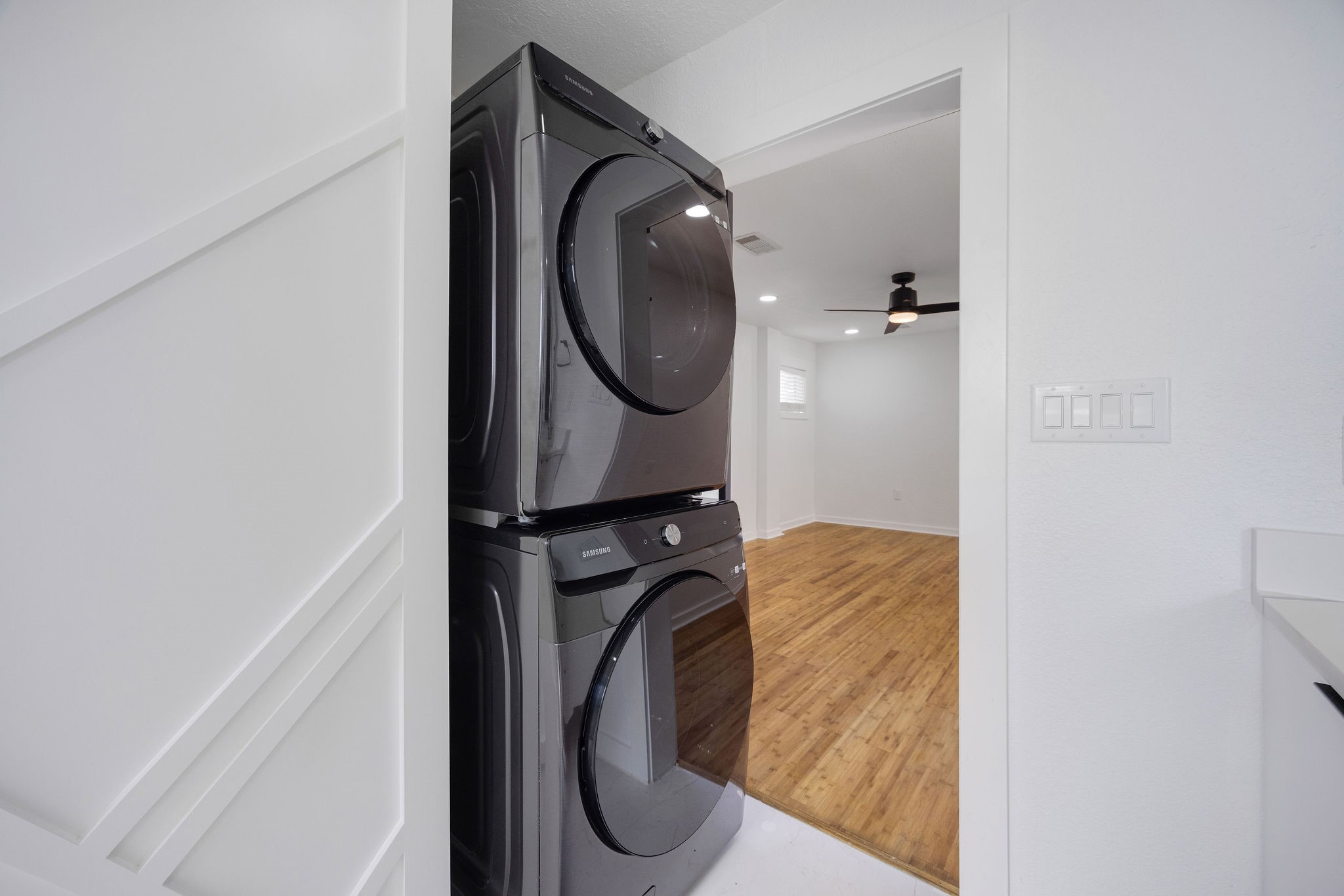 1310 Walton Street Houston, TX 77009 - Photo 12 of 19 Convenient in-home laundry with full-size stacked washer and dryer.