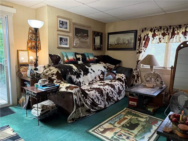 a bed room with furniture and a window