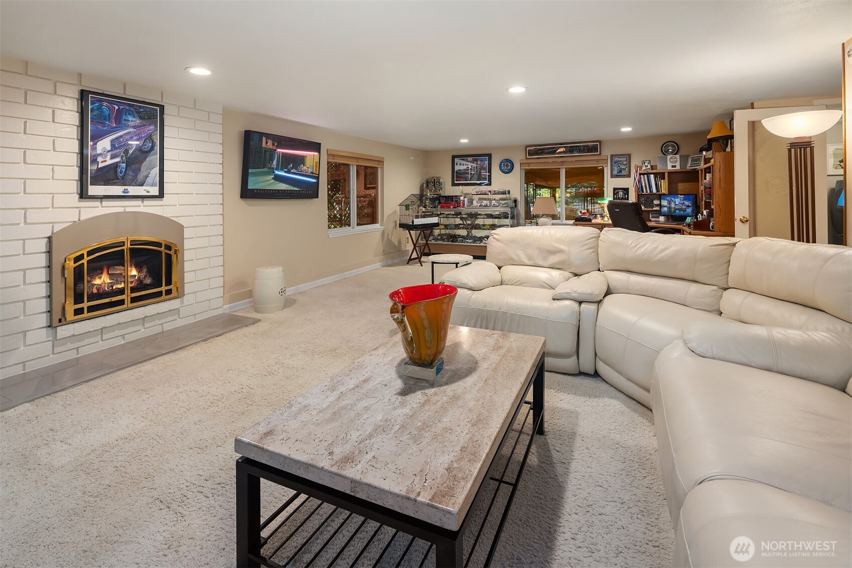 1616 175th Place Southeast Bothell, WA 98012 - Photo 17 of 37 a living room with furniture and a fireplace