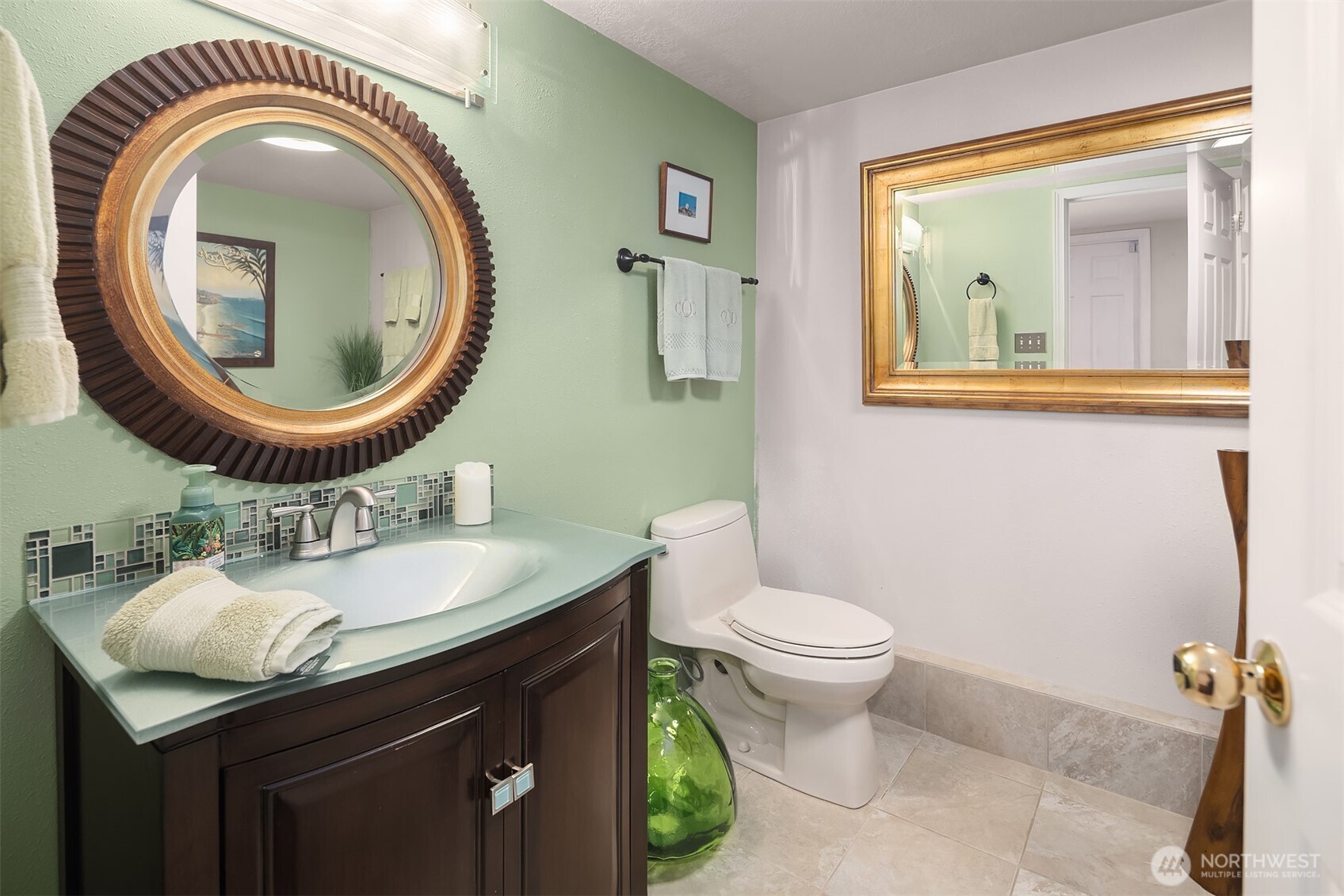 1616 175th Place Southeast Bothell, WA 98012 - Photo 18 of 37 a bathroom with a toilet a sink and a mirror