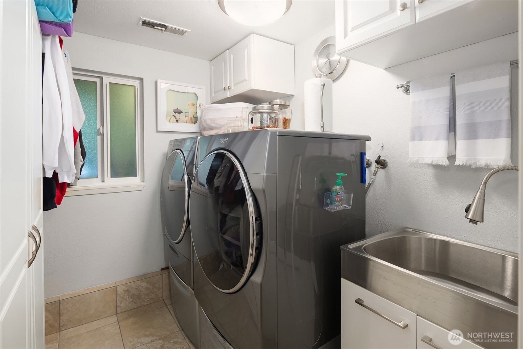 1616 175th Place Southeast Bothell, WA 98012 - Photo 20 of 37 a utility room with sink dryer and washer
