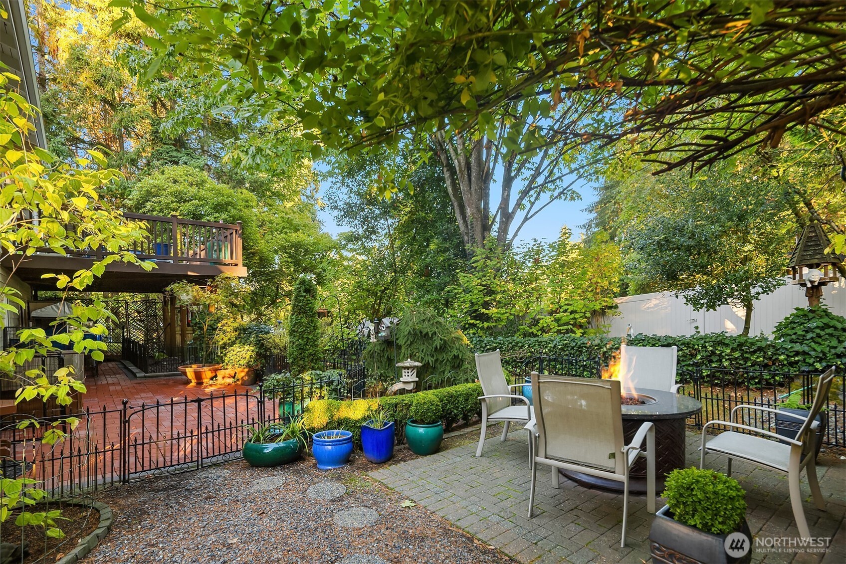 1616 175th Place Southeast Bothell, WA 98012 - Photo 22 of 37 a view of backyard with a table and chairs