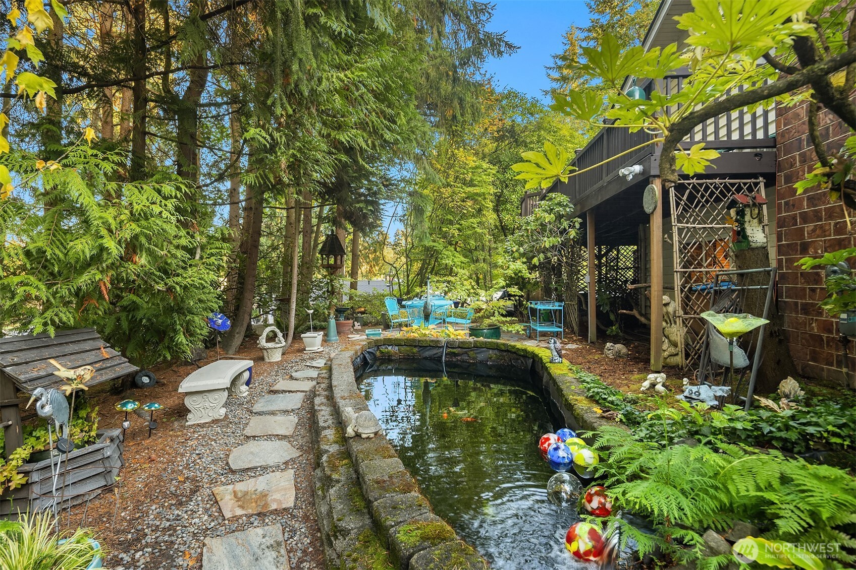 1616 175th Place Southeast Bothell, WA 98012 - Photo 24 of 37 a backyard of a house with lots of green space