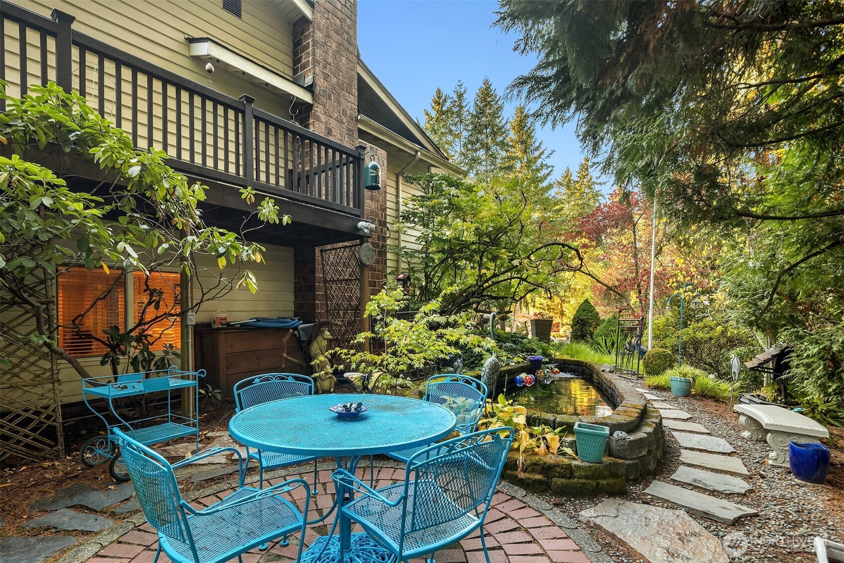 1616 175th Place Southeast Bothell, WA 98012 - Photo 26 of 37 a backyard of a house with table and chairs