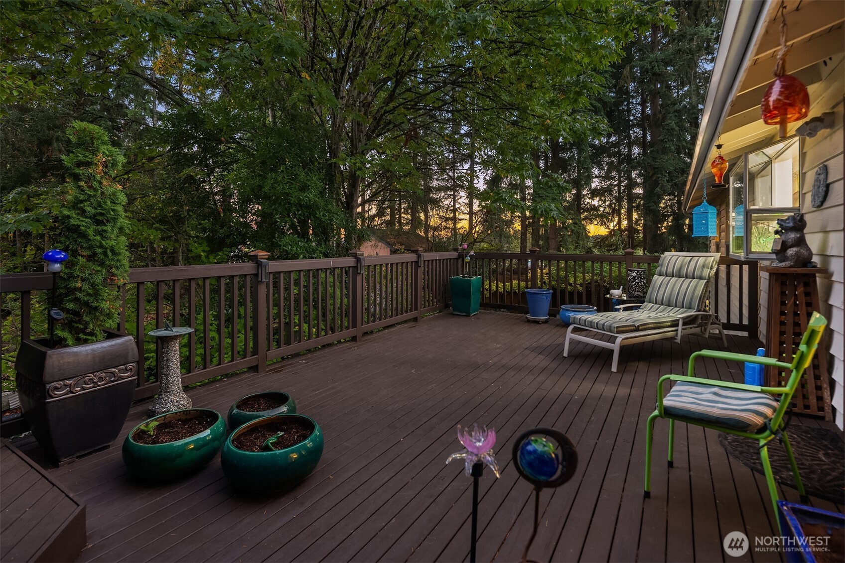1616 175th Place Southeast Bothell, WA 98012 - Photo 28 of 37 a view of a patio with couches table and chairs and potted plants