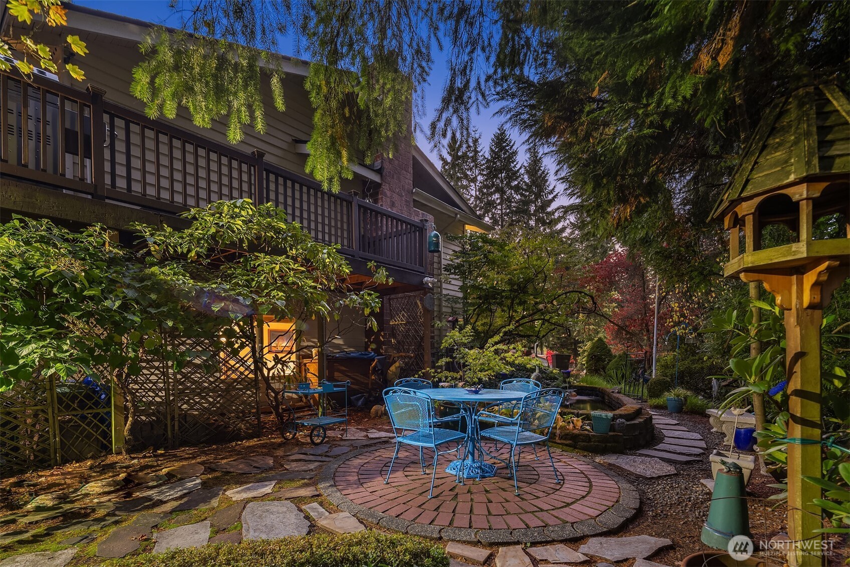 1616 175th Place Southeast Bothell, WA 98012 - Photo 32 of 37 a view of a backyard with plants and tree