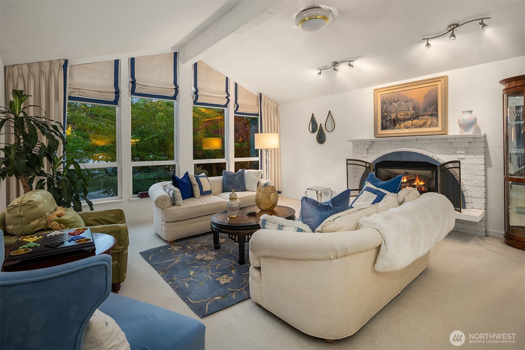 1616 175th Place Southeast Bothell, WA 98012 - Photo 5 of 37 a living room with furniture and a fireplace