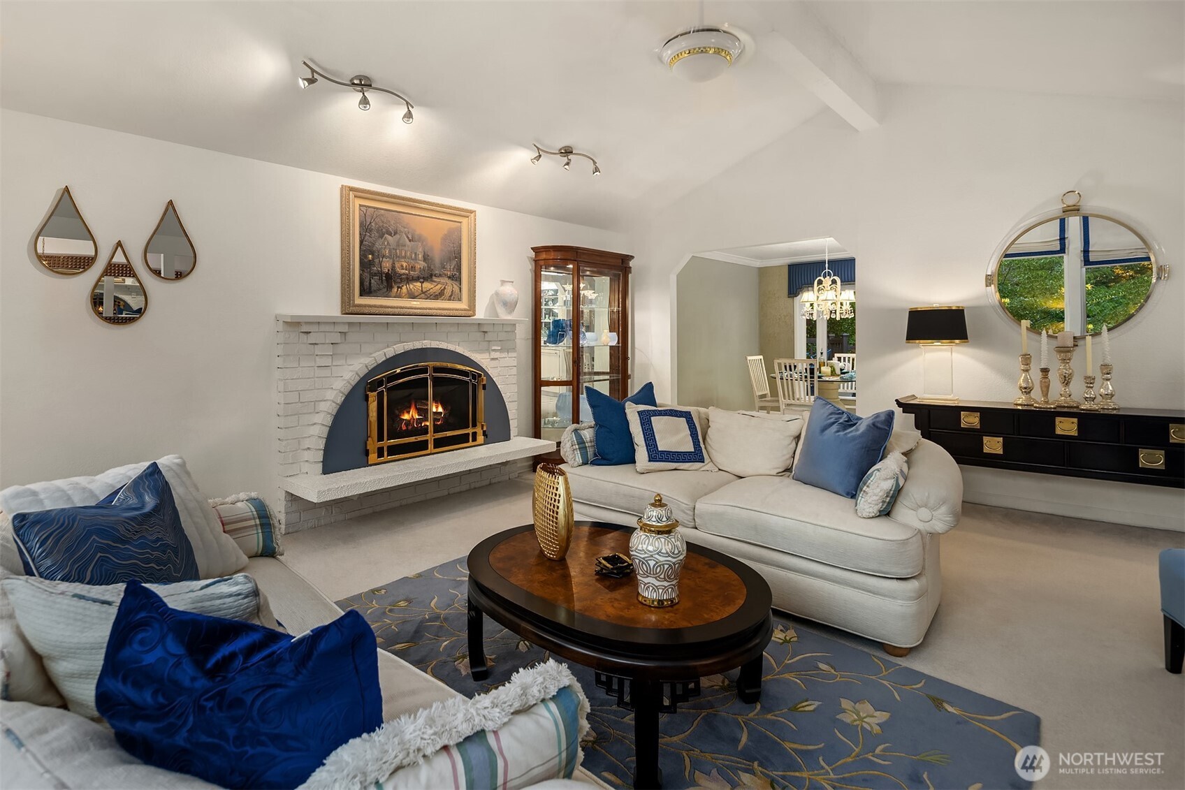 1616 175th Place Southeast Bothell, WA 98012 - Photo 6 of 37 a living room with furniture and a fireplace