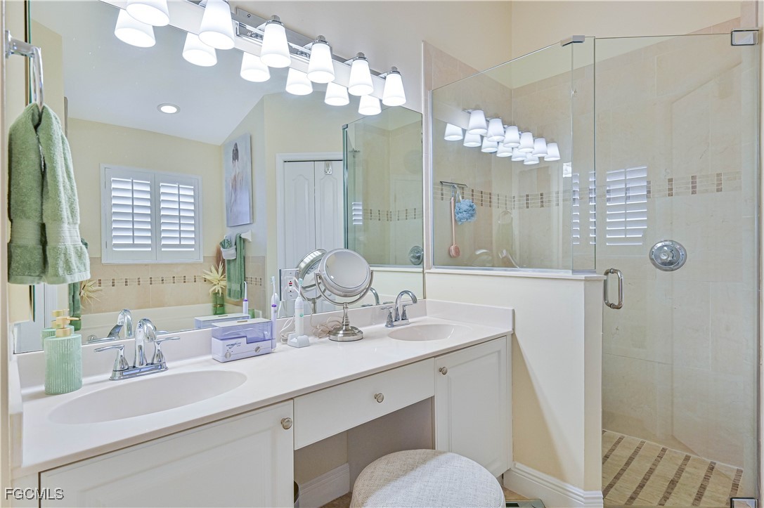 21593 Windham Run Estero, FL 33928 - Photo 29 of 49 a bathroom with a sink vanity granite and toilet