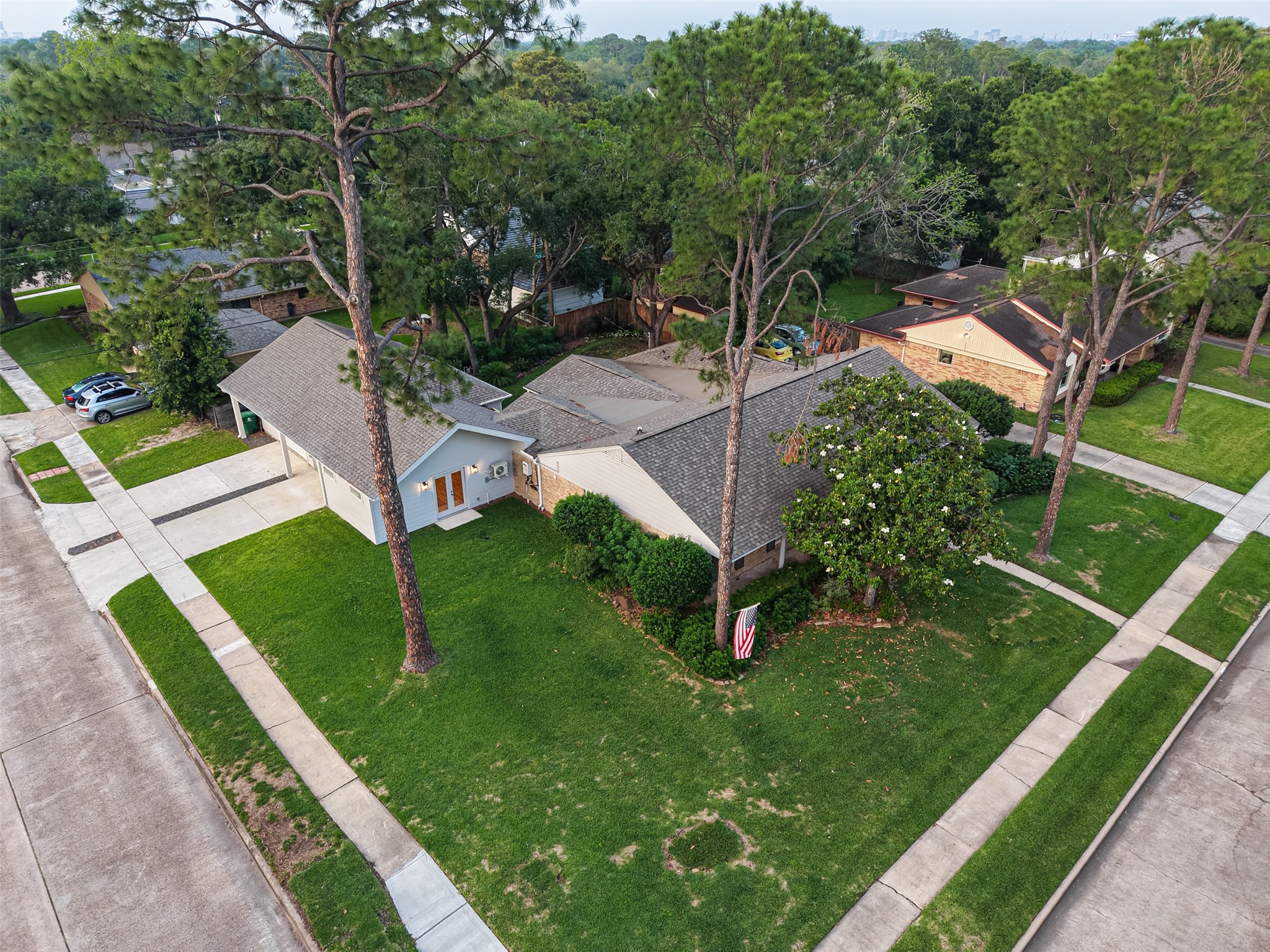 5638 Sanford Road Houston, TX 77096 - Photo 2 of 41 Featuring over 3,000 sq ft of expansive covered indoor and outdoor living space designed for comfort and entertaining.