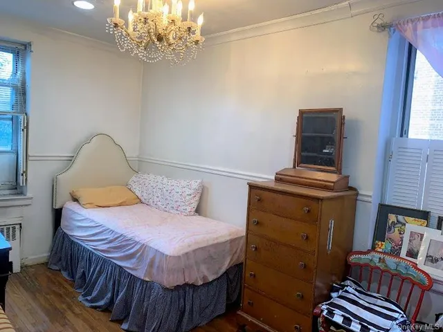 a kitchen with a refrigerator and a stove