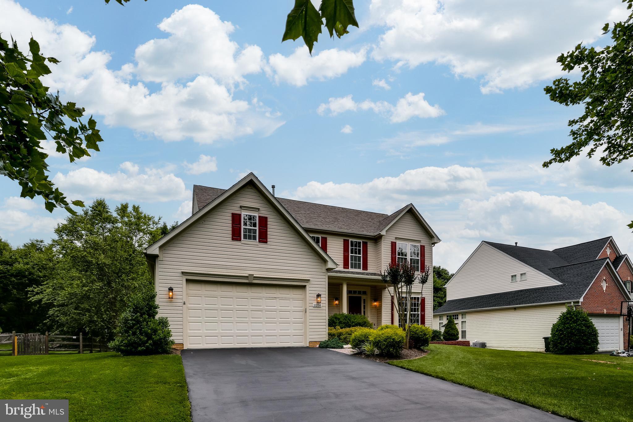 11208 Chaucers Ridge Court Laurel, MD 20723 - Photo 2 of 32 Two car garage with additional storage space