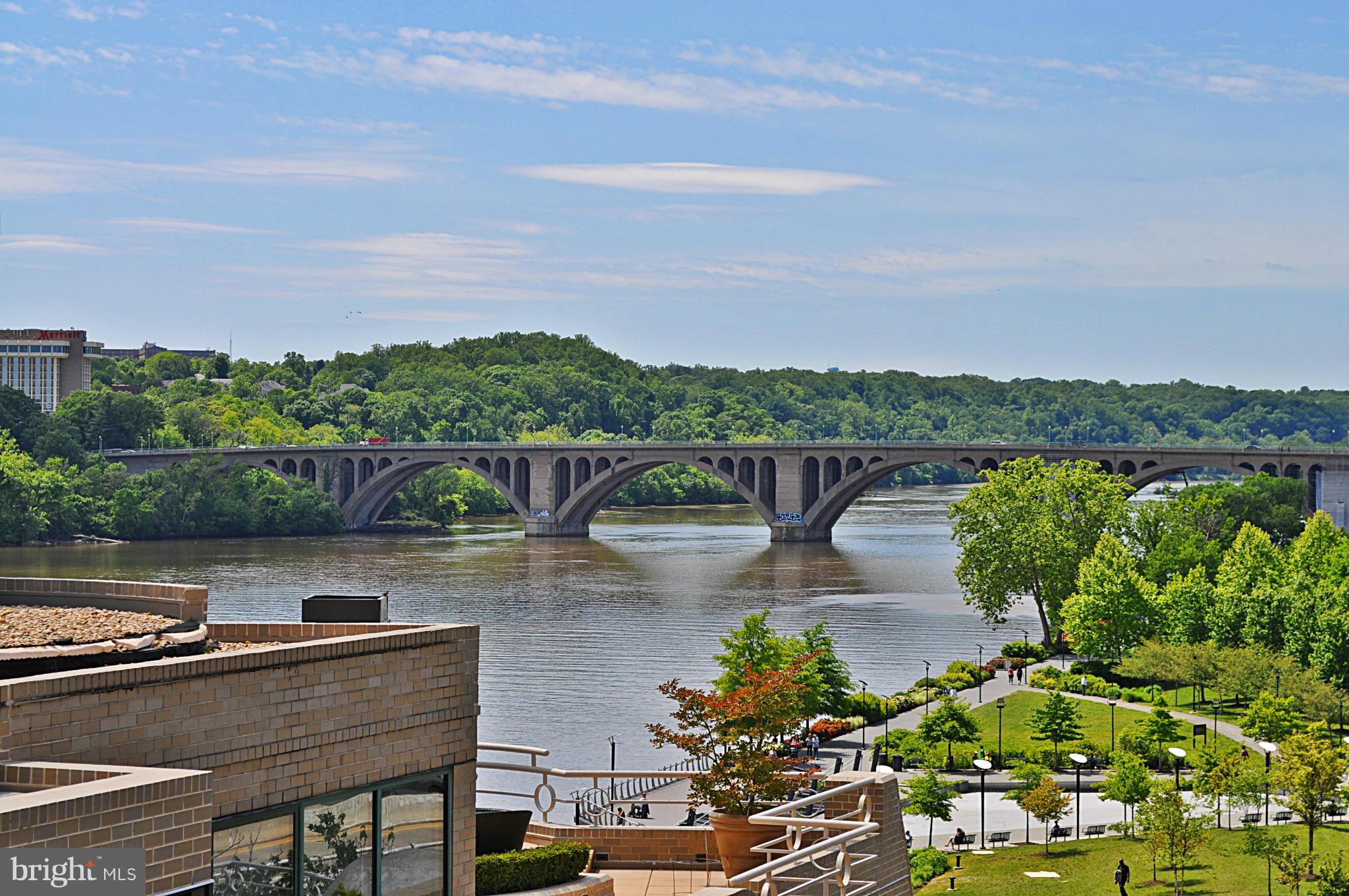 3030 K Street Northwest, Unit 204 Washington, DC 20007 - Photo 12 of 34 a view of a lake with a mountain in the background