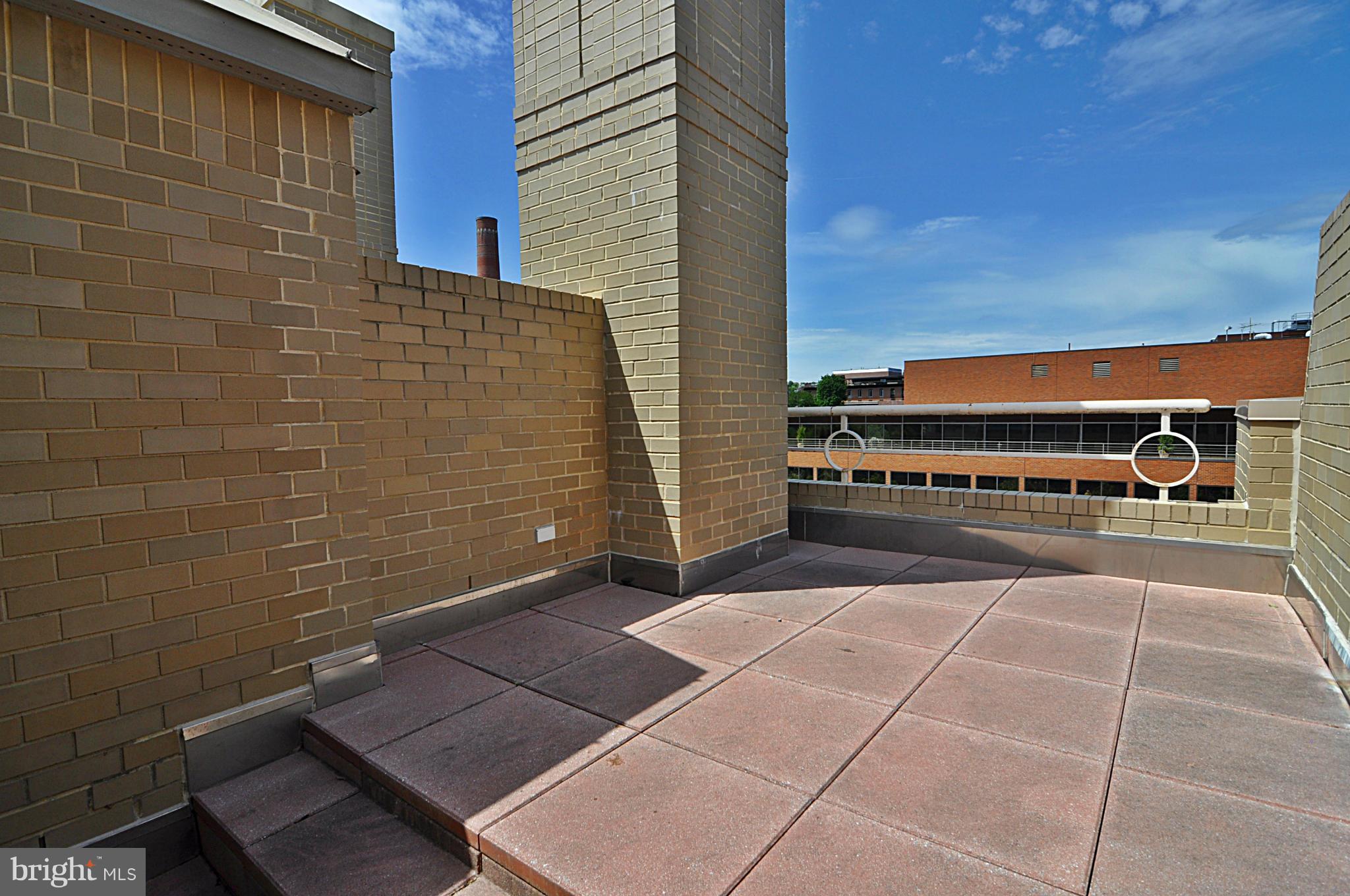 3030 K Street Northwest, Unit 204 Washington, DC 20007 - Photo 13 of 34 a view of a balcony with an outdoor space
