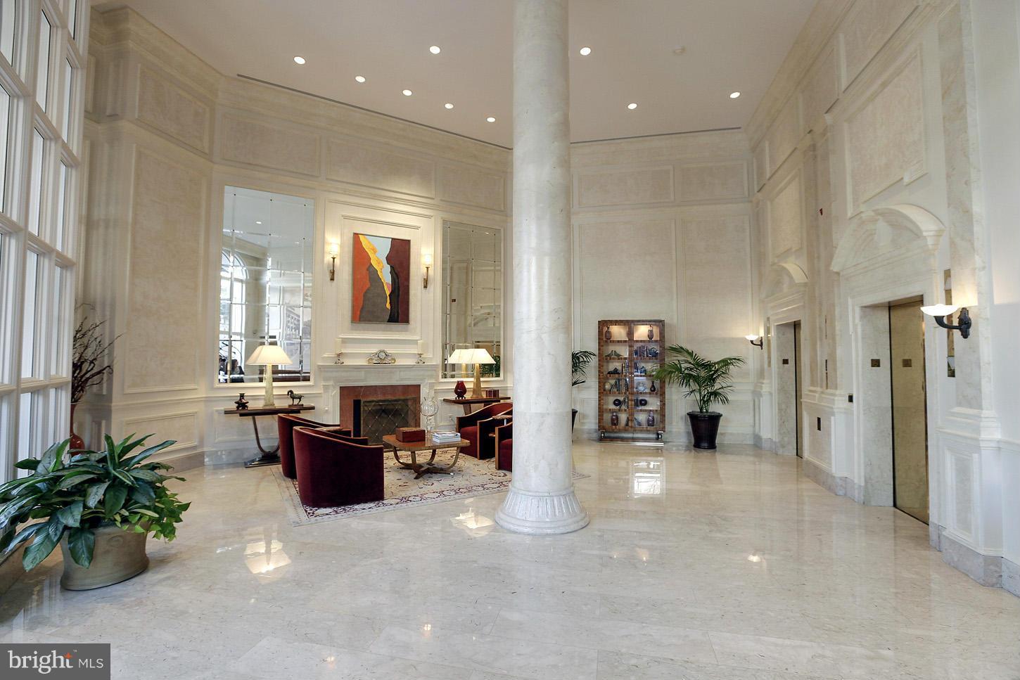 3030 K Street Northwest, Unit 204 Washington, DC 20007 - Photo 2 of 34 a view of a livingroom with furniture and a flat screen tv