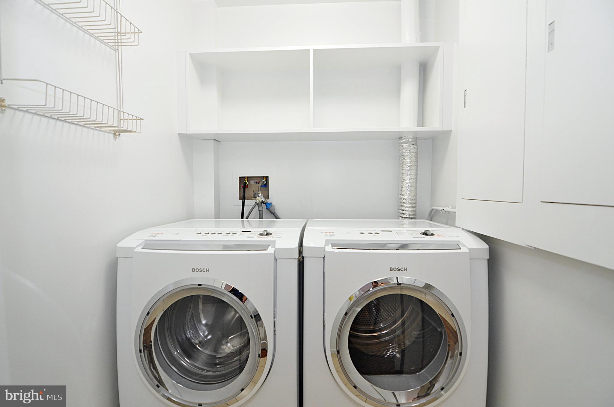 3030 K Street Northwest, Unit 204 Washington, DC 20007 - Photo 22 of 34 a utility room with dryer and washer