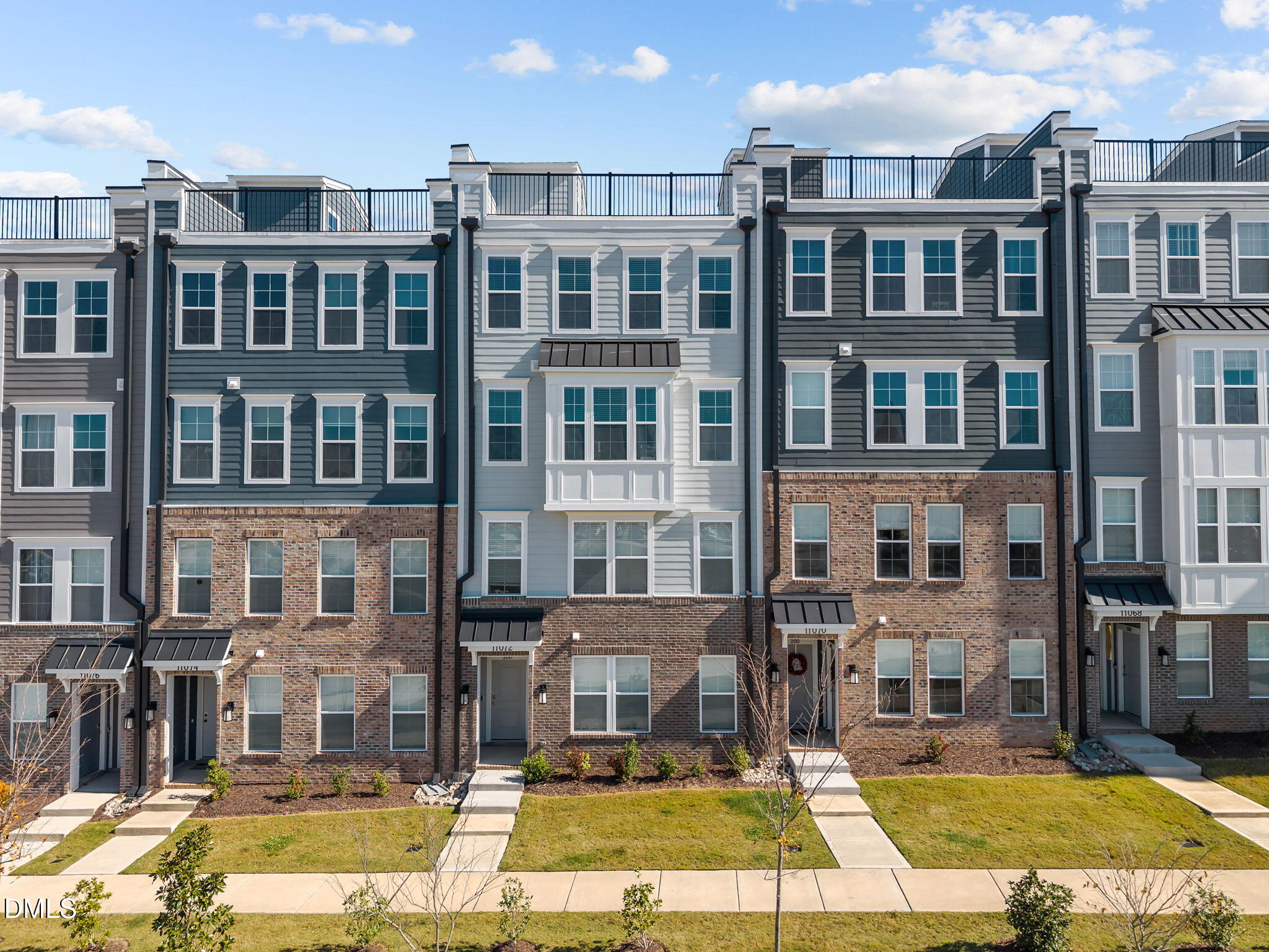 a view of large building with a swimming pool