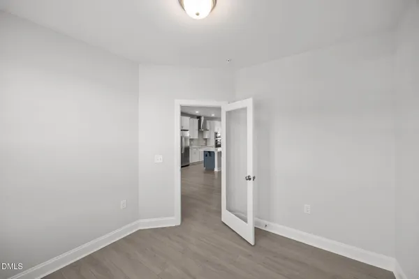 an empty room with windows