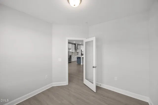 an empty room with windows