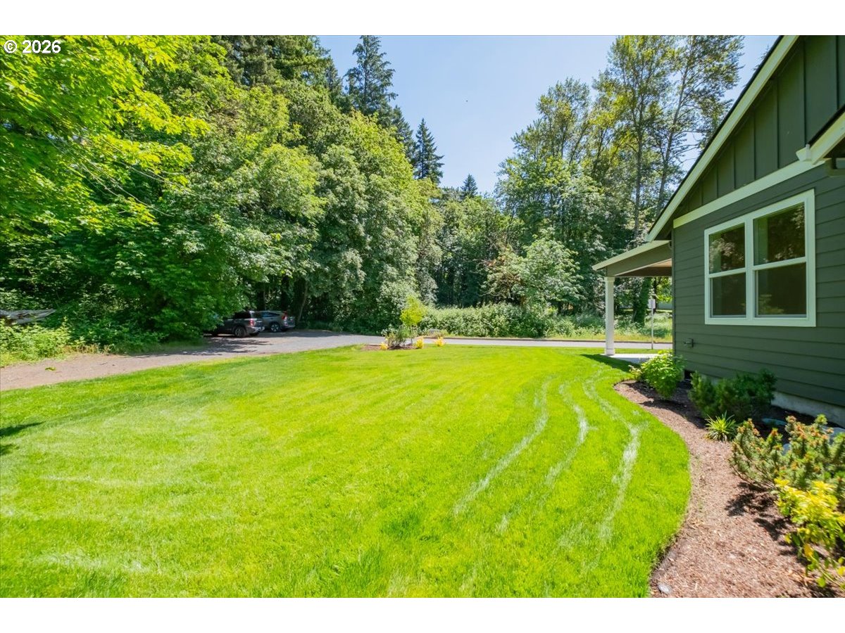 2147 Northeast Spitz Road Canby, OR 97013 - Photo 43 of 48 a view of a house with a swimming pool