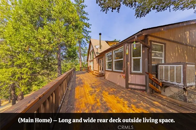 a view of swimming pool with seating area